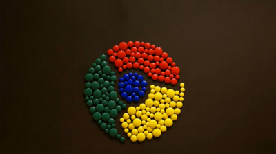 Chrome logo constructed using magnets